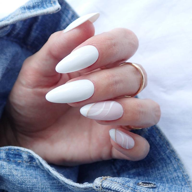 Białe paznokcie: nowoczesne zdobienie na każdą porę roku